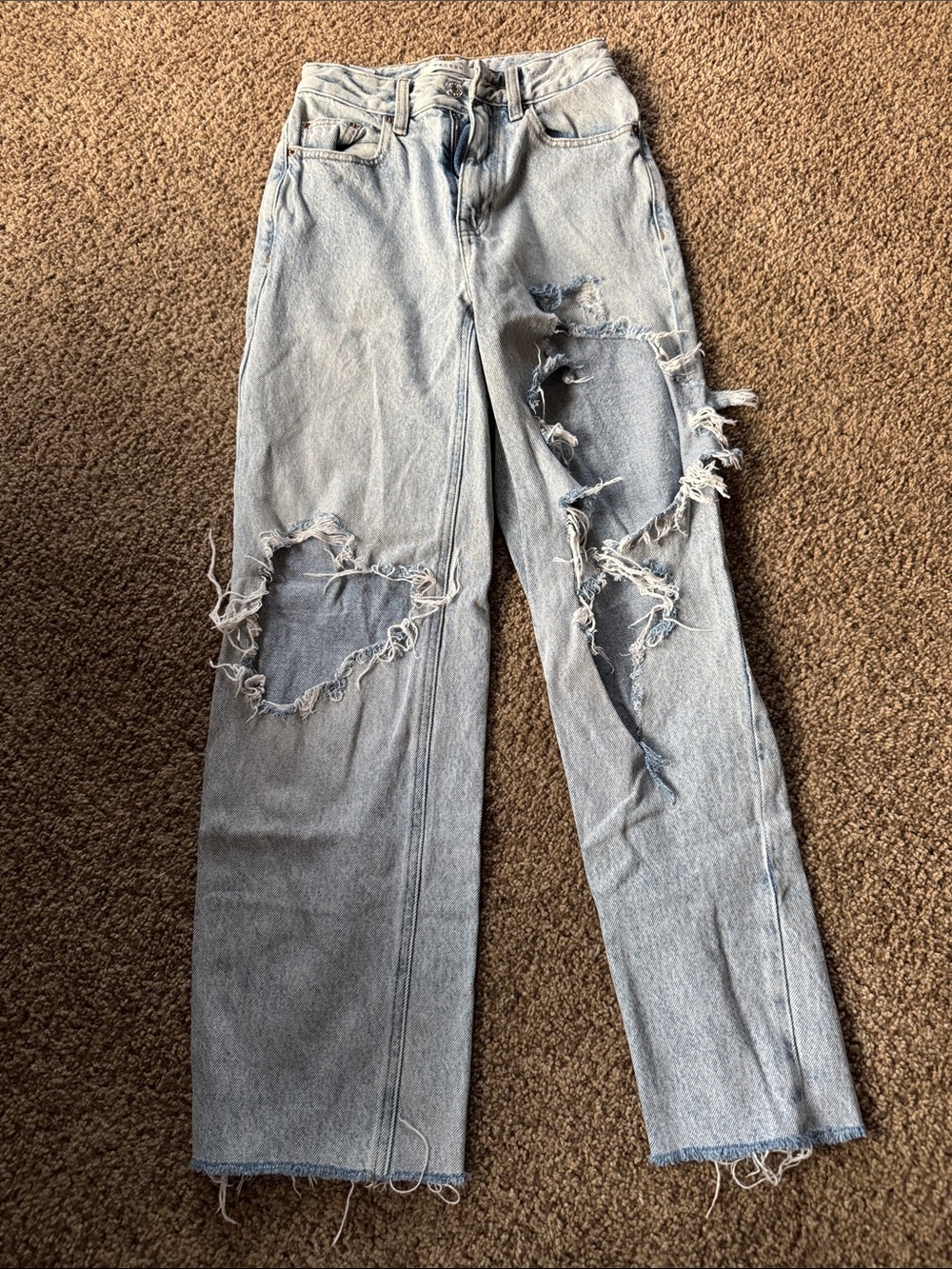 Light Wash Distressed Women’s Jeans - size 23 from Pac Sun